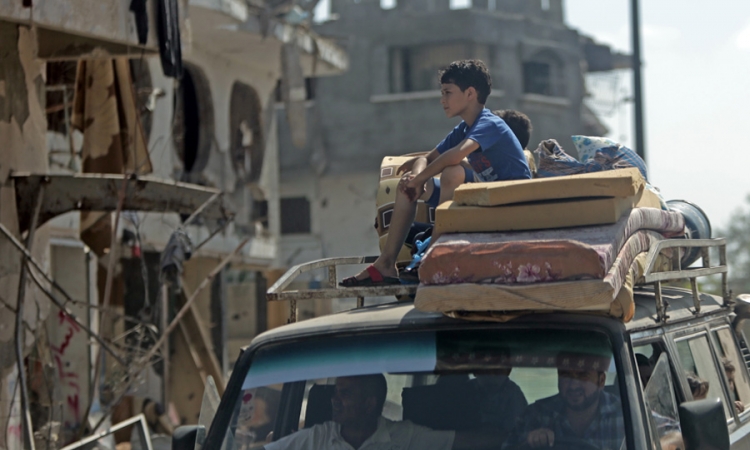 Stanovnici pojasa Gaze se vraćaju razrušenim kućama