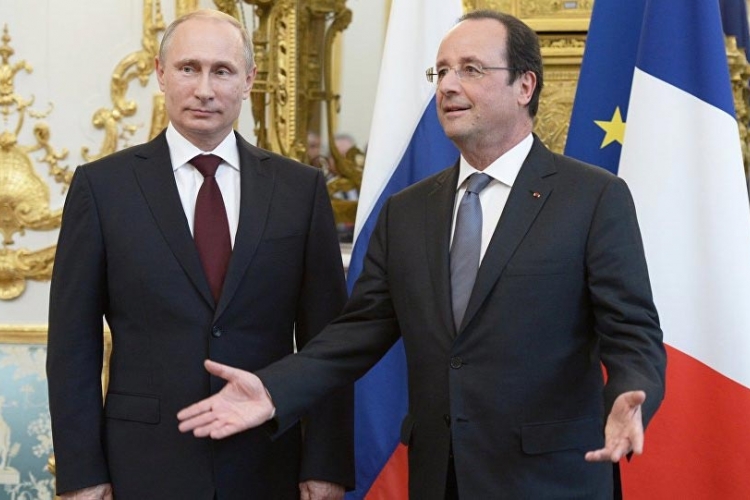 Putin i Oland odlučno za formiranje koalicije