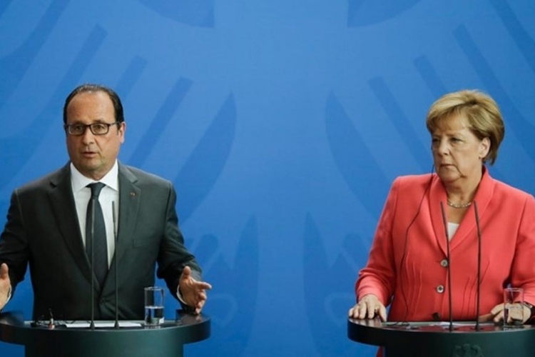 Oland, Merkel: Evropa sporo reagovala na izbjegličku krizu