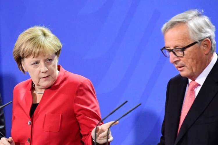 Merkel: Poštujem odluku Mej; Junker: Hrabra žena