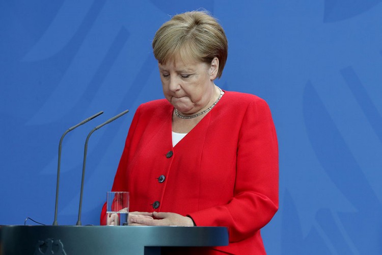 Drhtavica Merkelove - alkoholizam ili Parkinsonova bolest?