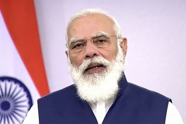 Indijac podnio tužbu, ne želi fotografiju premijera Modija na kovid propusnici